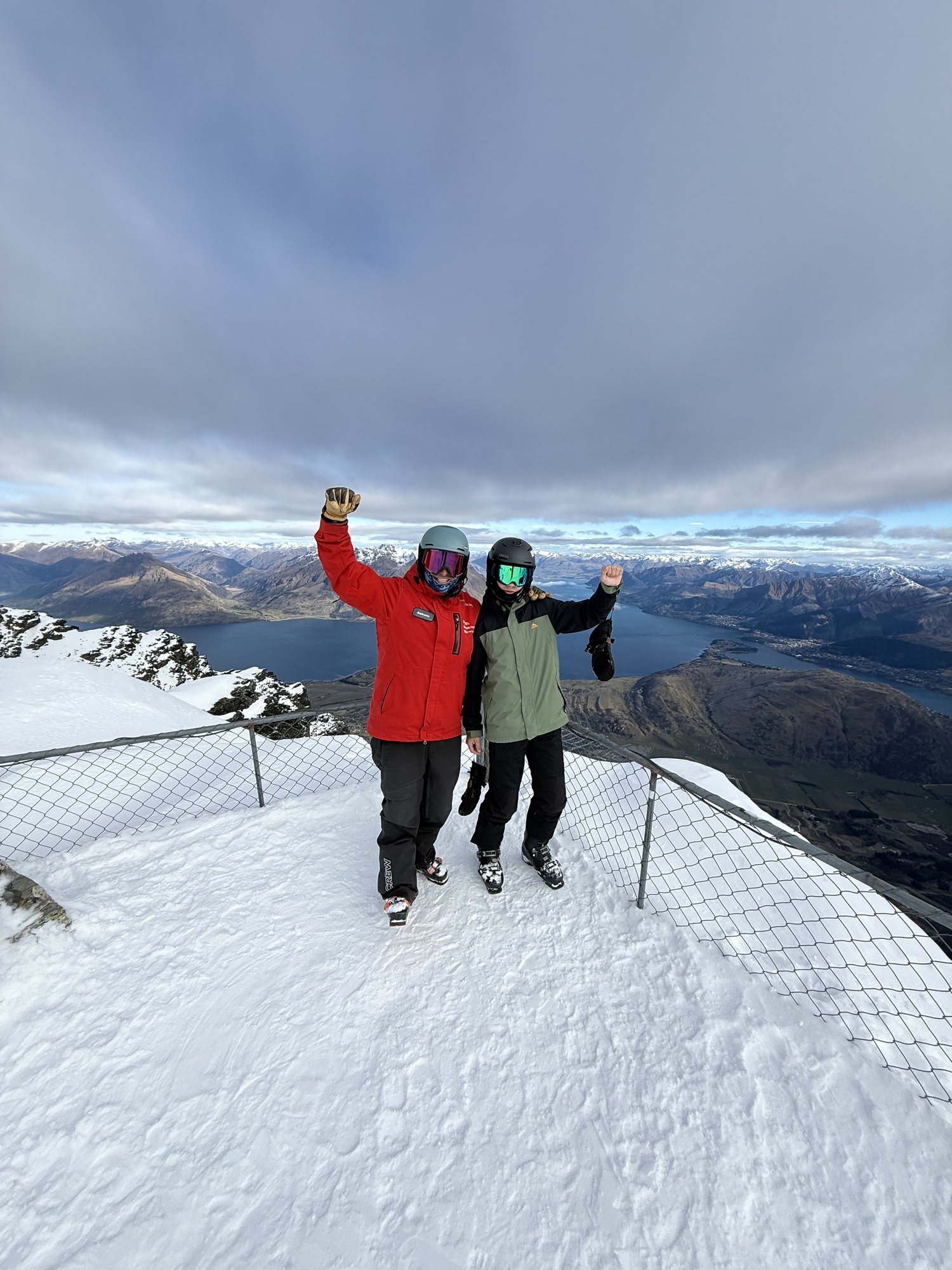 Ash Johns skiing with a guest in Queenstown